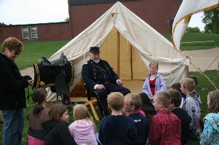 Major Norris explains daily life of citizen soldier